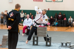 Male Breaking Concrete Blocks